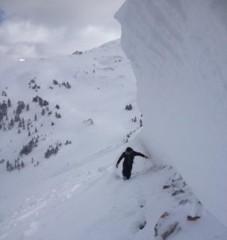 Man Climbing in Snow