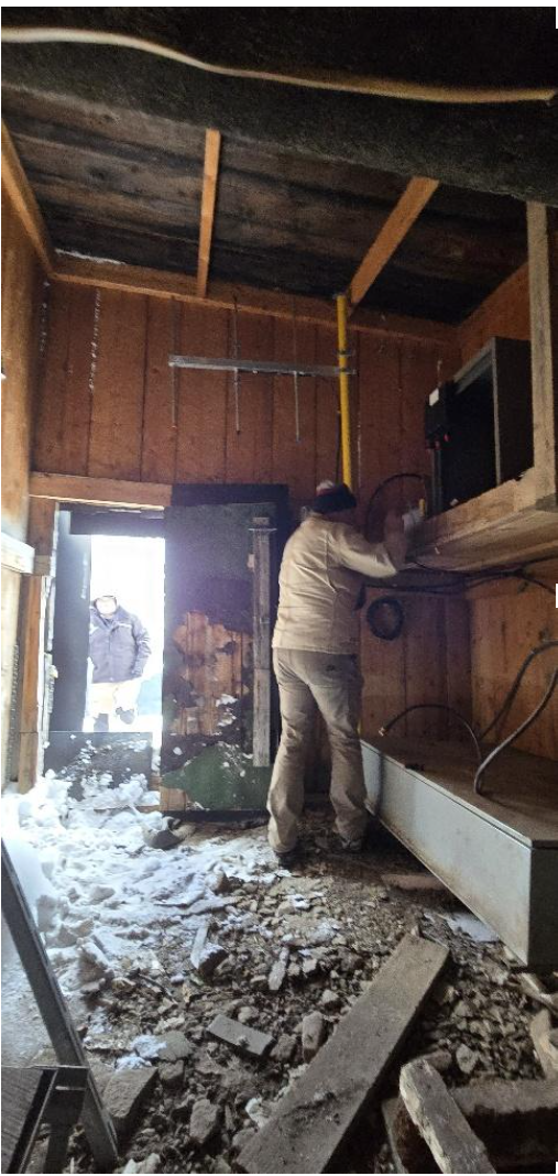 Terry Carter removing equipment from Ptarmigan