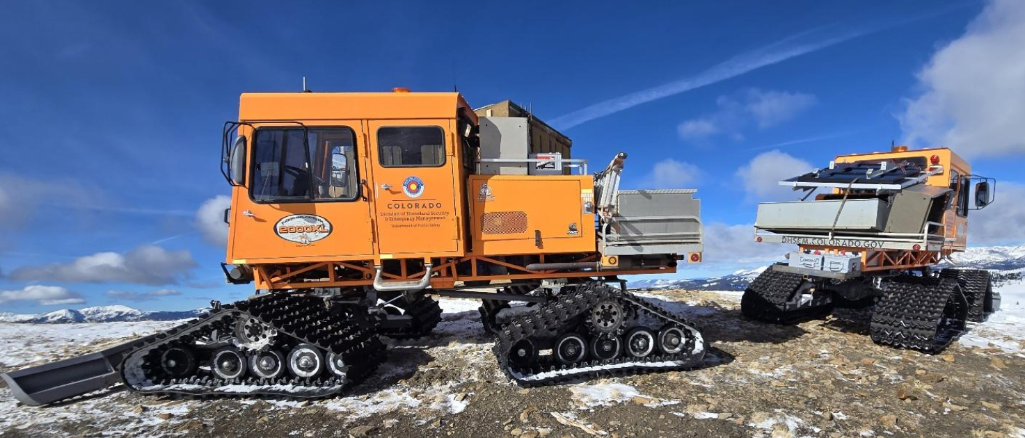 Snowcats loaded and ready to roll.